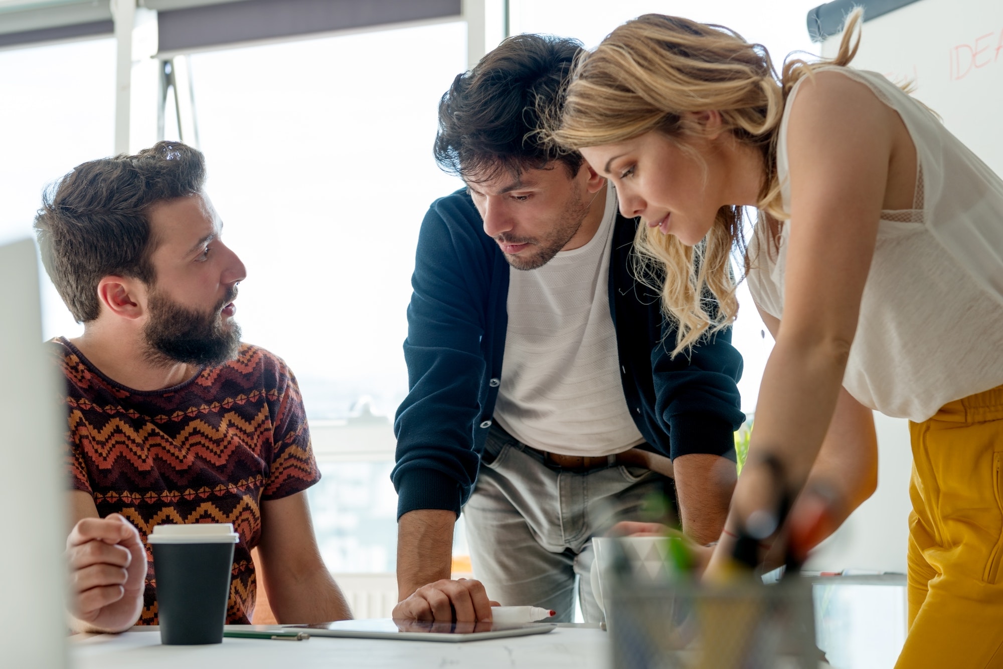 Three young people at office