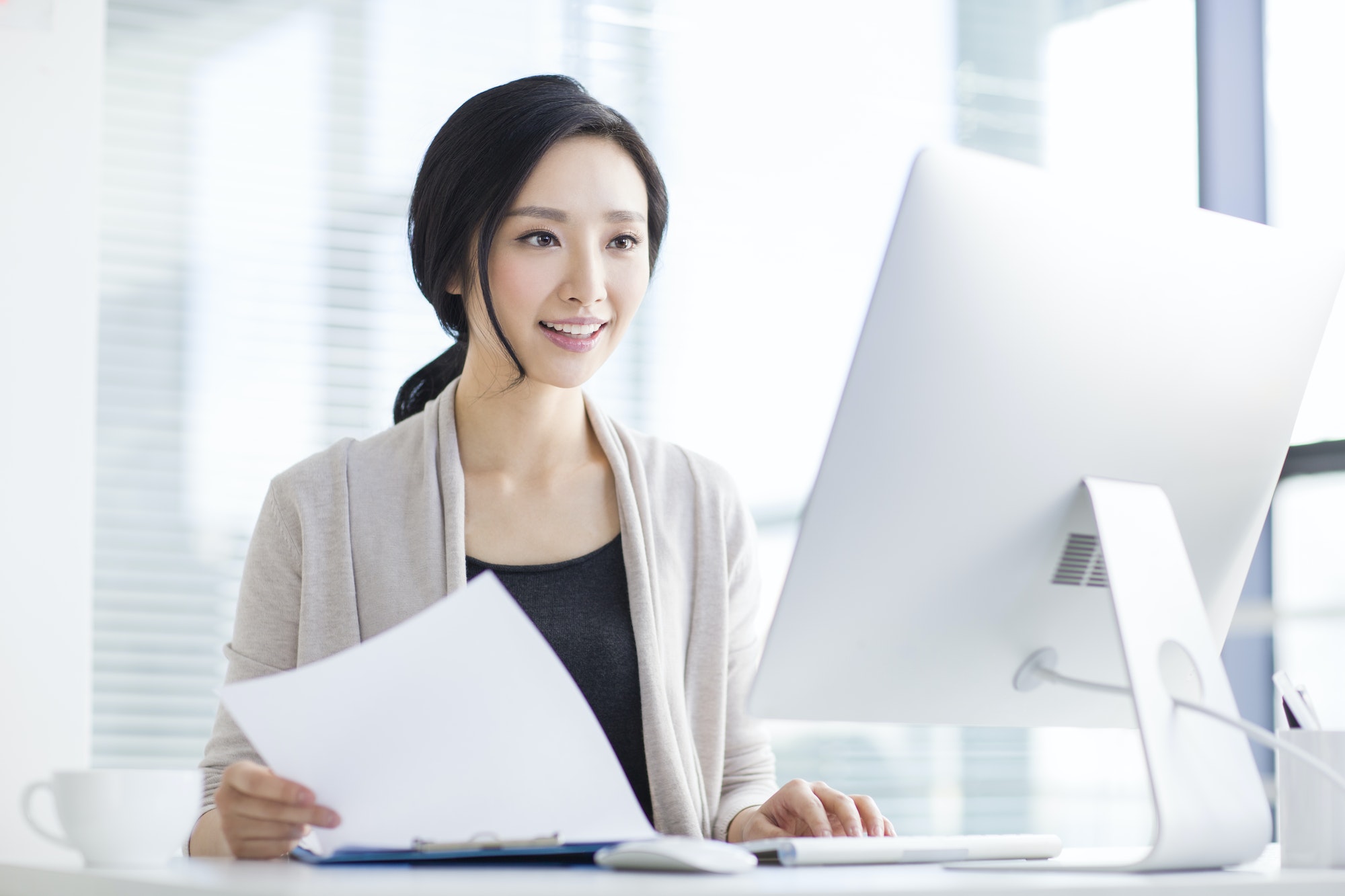 Young woman working in office